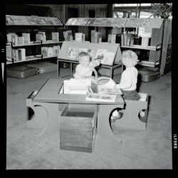 Children in children's section of Gisborne Public Library between ca 1962 and 1970.